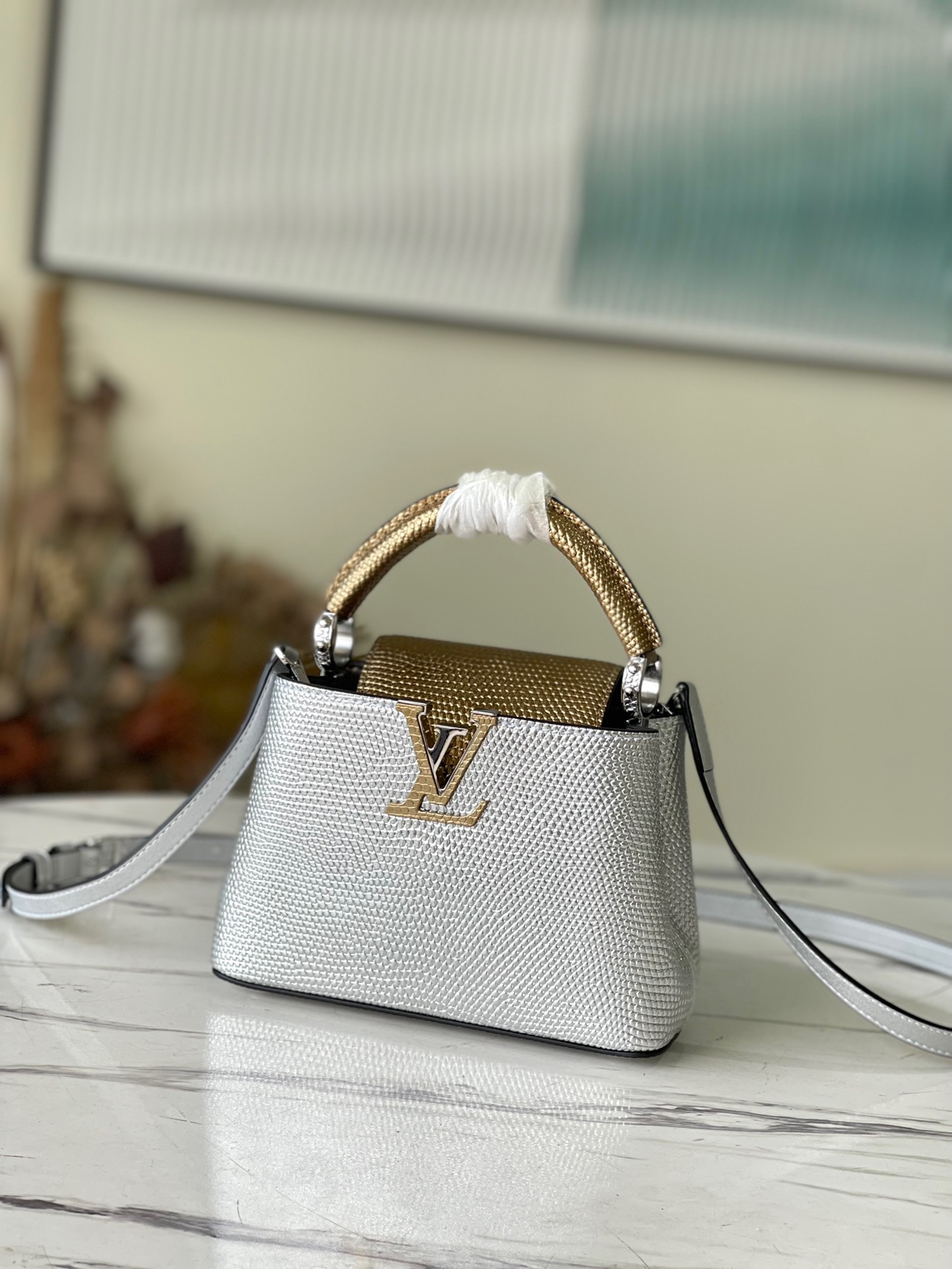 Louis Vuitton Capucines Mini Handbag in Silver and Gold