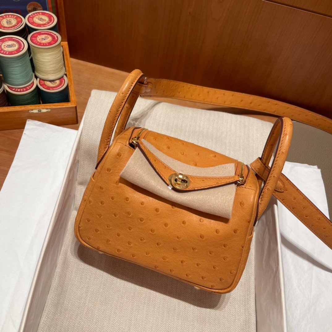 fb638e_1abbdf2cb6b94af2b30500bab2750dcdmv2.jpg Lindy 24 Ostrich Amber Yellow - Image 1