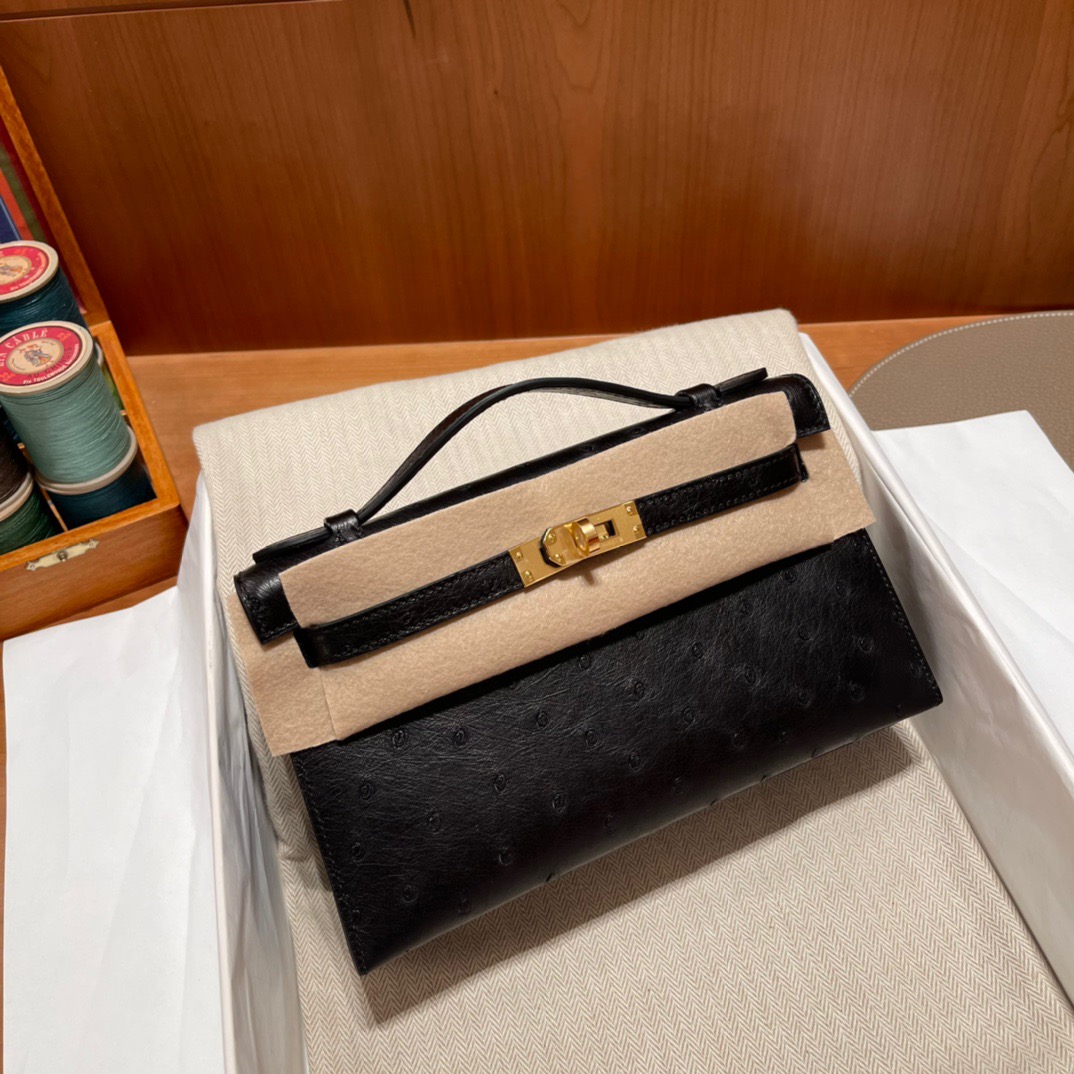 fb638e_1c0dff852d754c03bafb9fadda5c78c0mv2.jpg Kelly Pochette Ostrich Graphite - Image 1