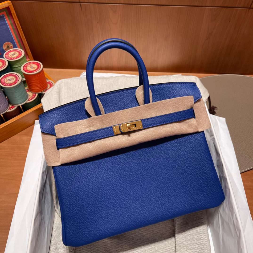 fb638e_2136e635c36a41698fbd4ba91657a633mv2.jpg Birkin 25 Togo Blue Electric - Image 1