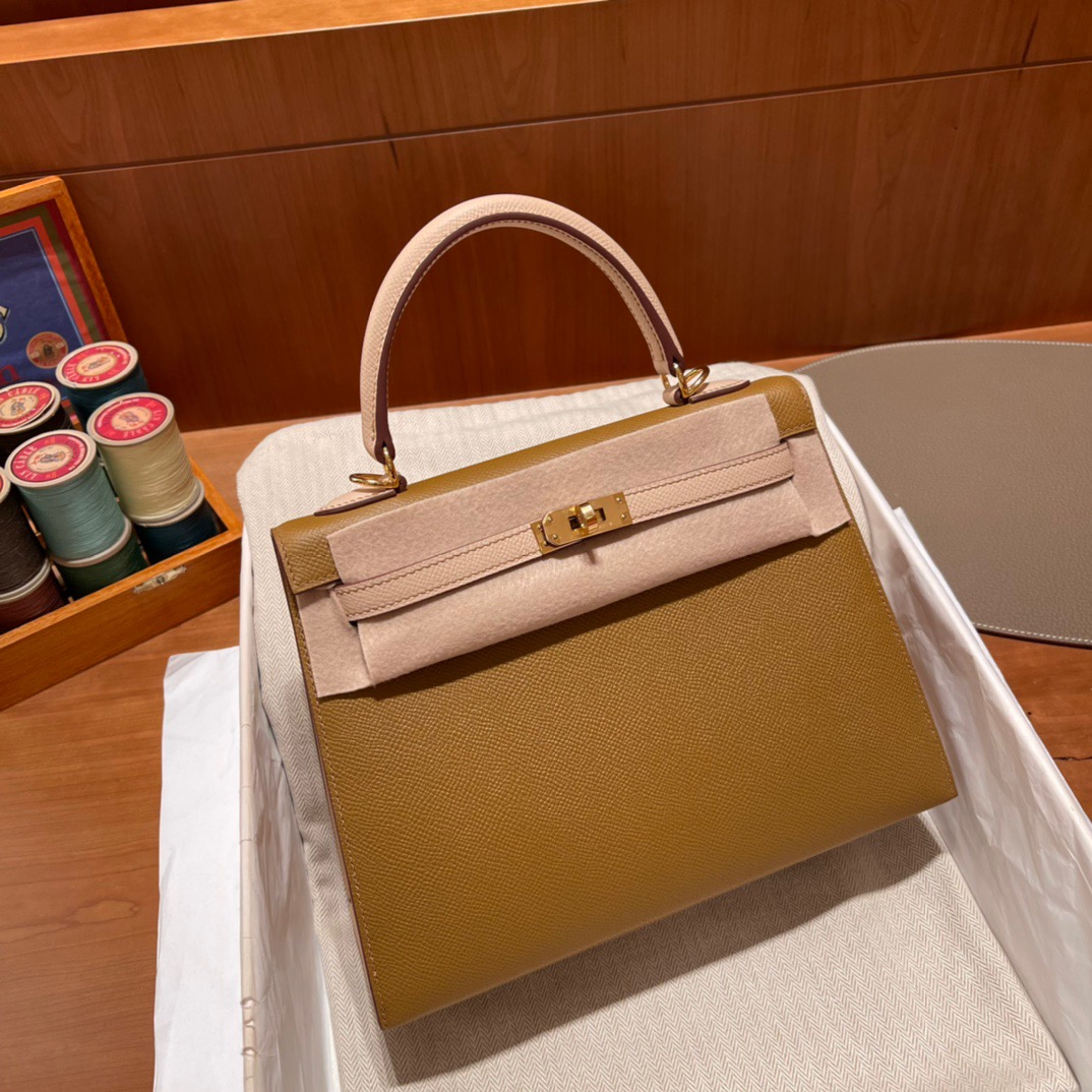 fb638e_251b2f4b3da44d90afdbd788c8a3b057mv2.jpg Kelly So 25 Epsom Bronze&Pink - Image 1