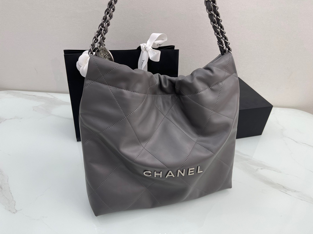 fb638e_28bd07a360504bfbb26b4e2bf62baa4dmv2.jpg Chanel 22B Bag in Dark Grey - Image 1