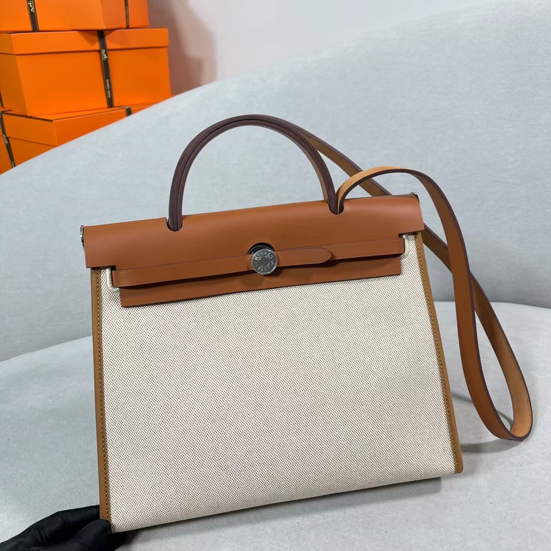 fb638e_3f06c2d71d0d4cfeb060615431f20909mv2.jpg Herbag 31 Hunter&Canvas Apricot&Golden Brown - Image 1