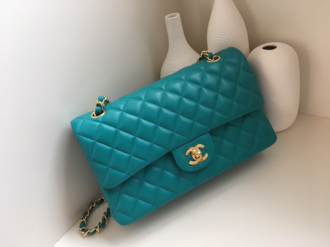 fb638e_3f3a030f57c64b0a8910271db3e477f4mv2.jpg Chanel Classic Flap 25 Lake Blue - Image 1