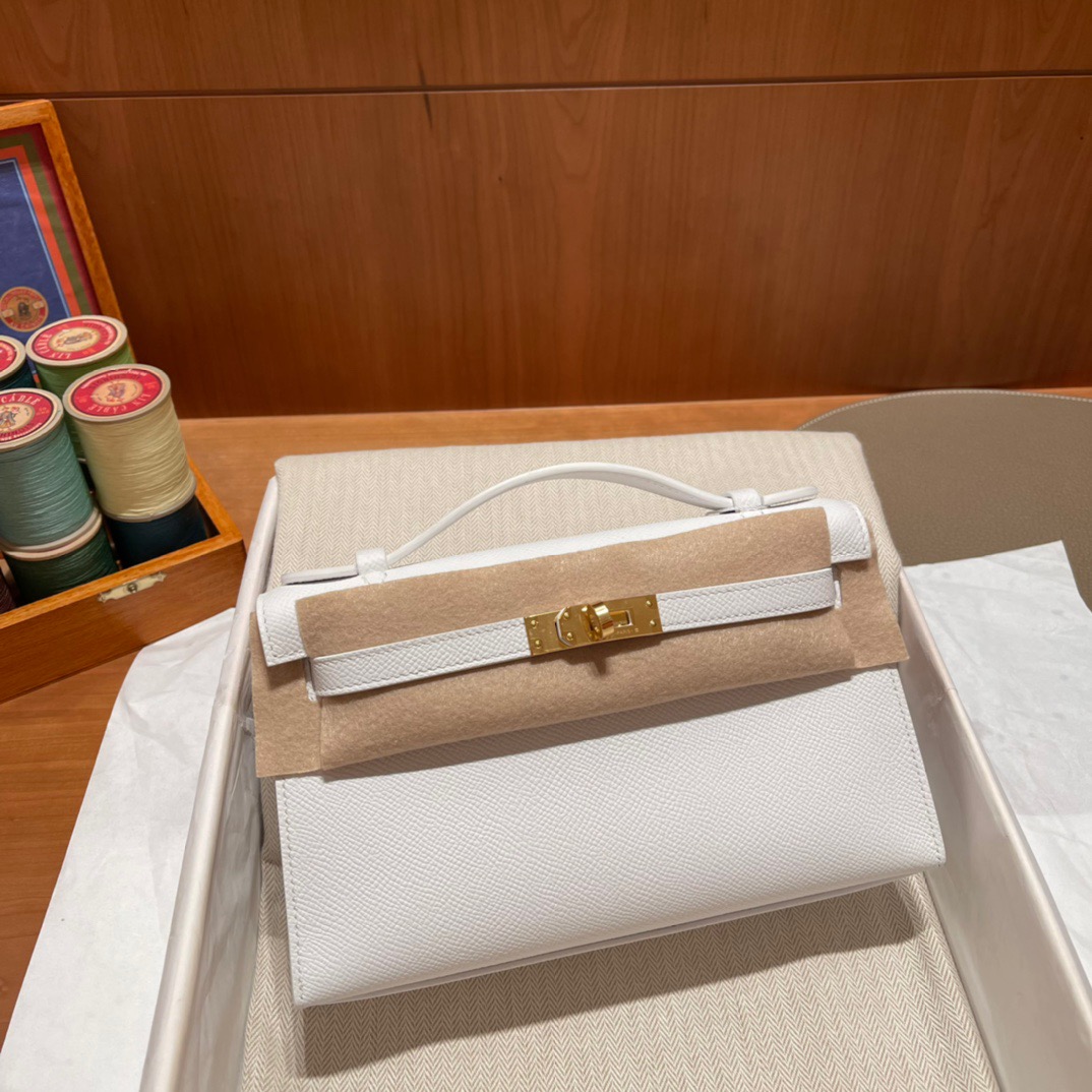 fb638e_4255b07b353d4bd697fc3c4f9c73b43emv2.jpg Kelly Pochette Epsom Blanc - Image 1
