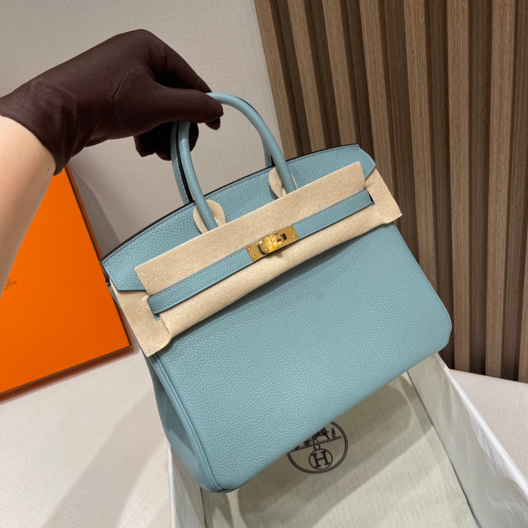 fb638e_4b7e6b8851f44a85b6ac7d37e57180bbmv2.jpg Birkin 25 Togo Azure Blue - Image 1