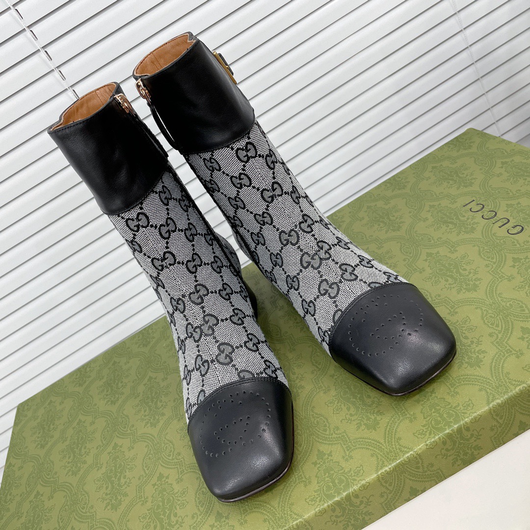 fb638e_4c4d6e8542fd4f4abb3582d6d6aebd81mv2.jpg Gucci Ankle Boots - Image 1