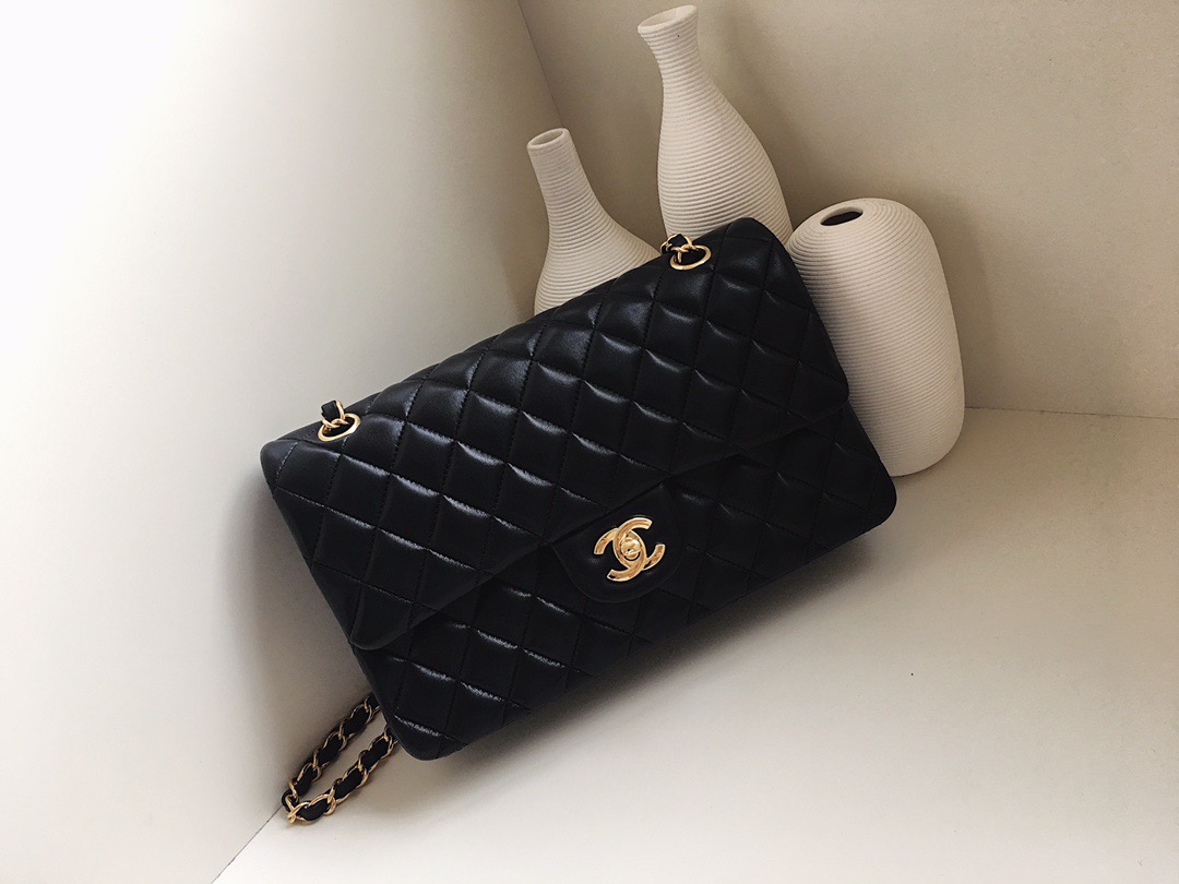 fb638e_5269e1ba1bf640d99d5dab51060277f3mv2.jpg Chanel Classic Flap 25 Jumbo Black - Image 1