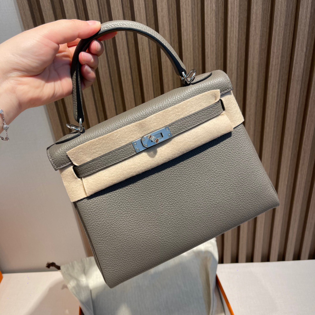 fb638e_52a5efa426b342038018b6ac1f57c203mv2.jpg Kelly 25 Togo Pewter Grey - Image 1