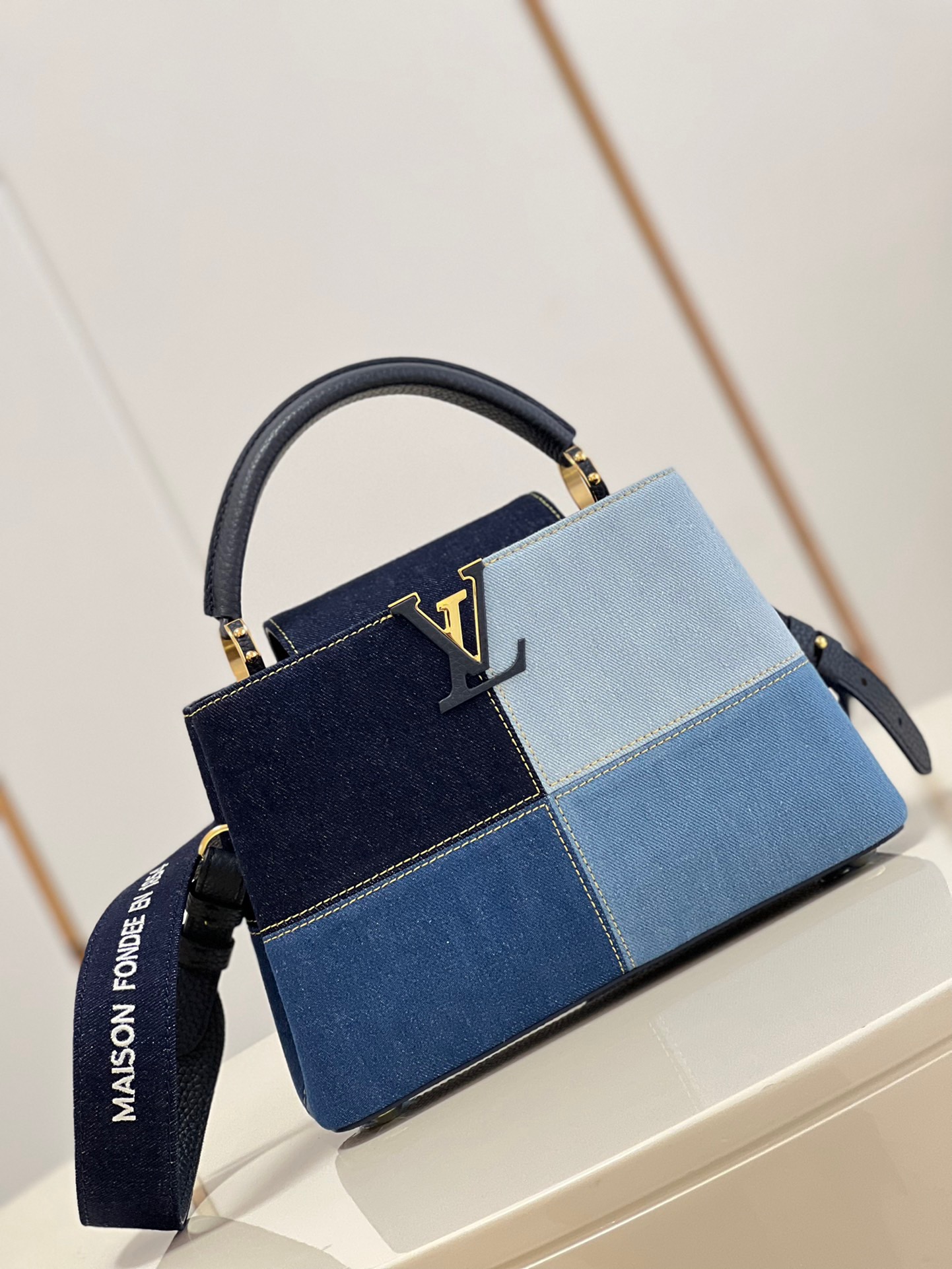 fb638e_5878af3d768c4474b8f756bb636e85afmv2.jpg Louis Vuitton Capucines BB Small Handbag in Denim - Image 1