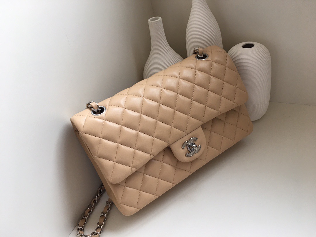 fb638e_59303228ed8943eeb3985e73f3d6fff4mv2.jpg Chanel Classic Flap 25 Apricot - Image 1