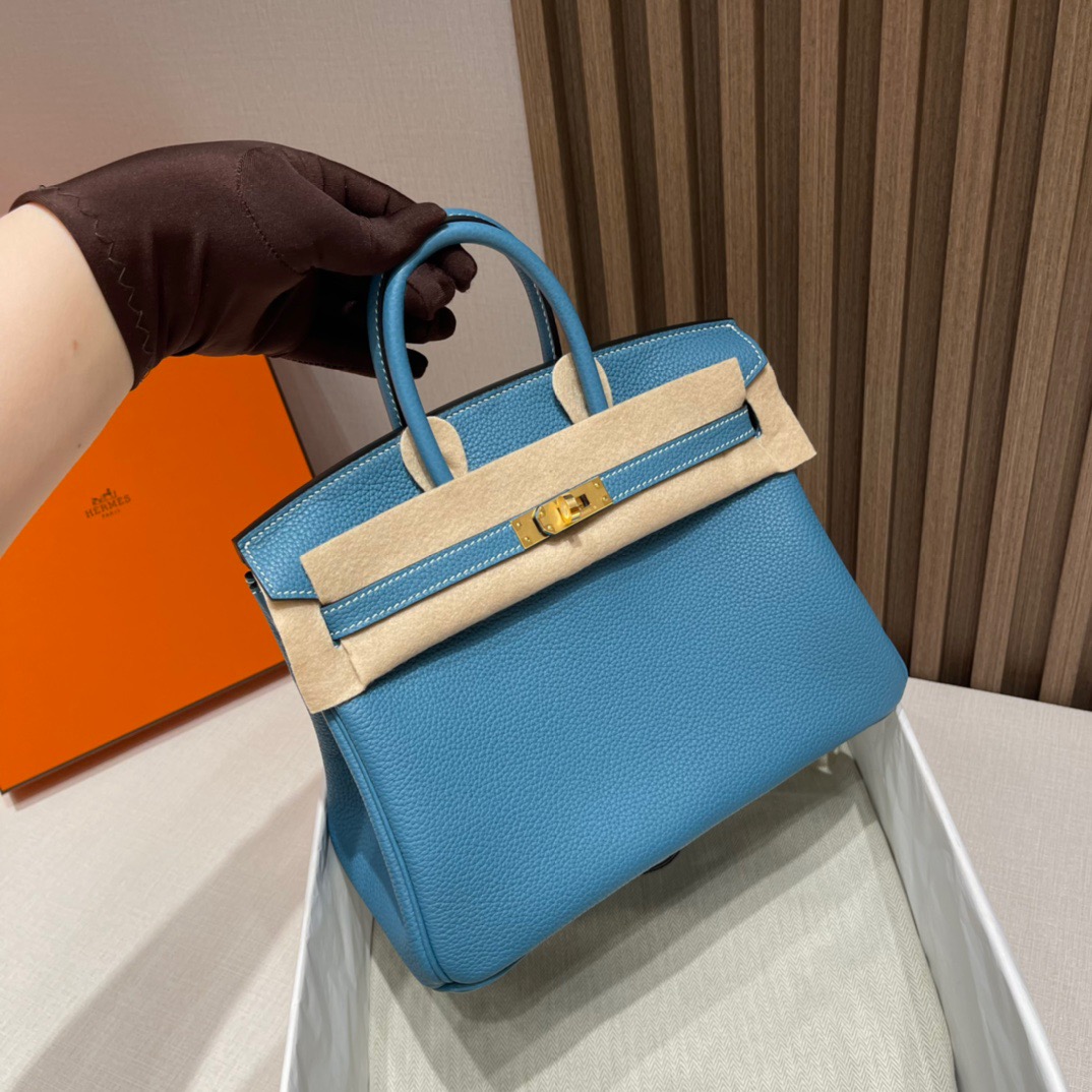 fb638e_5f8cba687a6748a4b292eb415cd17e85mv2.jpg Birkin 25 Togo Denim Blue - Image 1