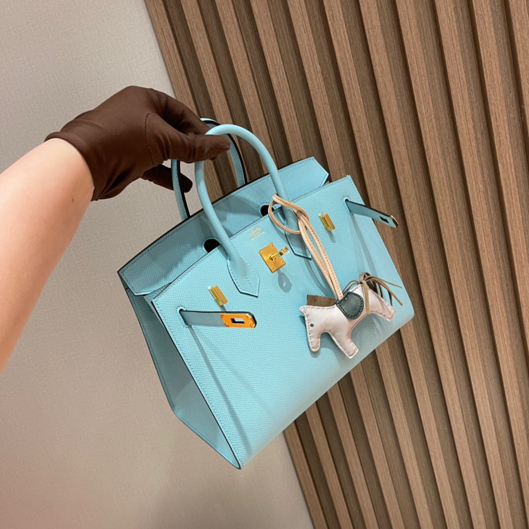 fb638e_6285803381304e84baaf92ab15274317mv2.jpg Birkin Sellier 25 Blue Atoll - Image 1