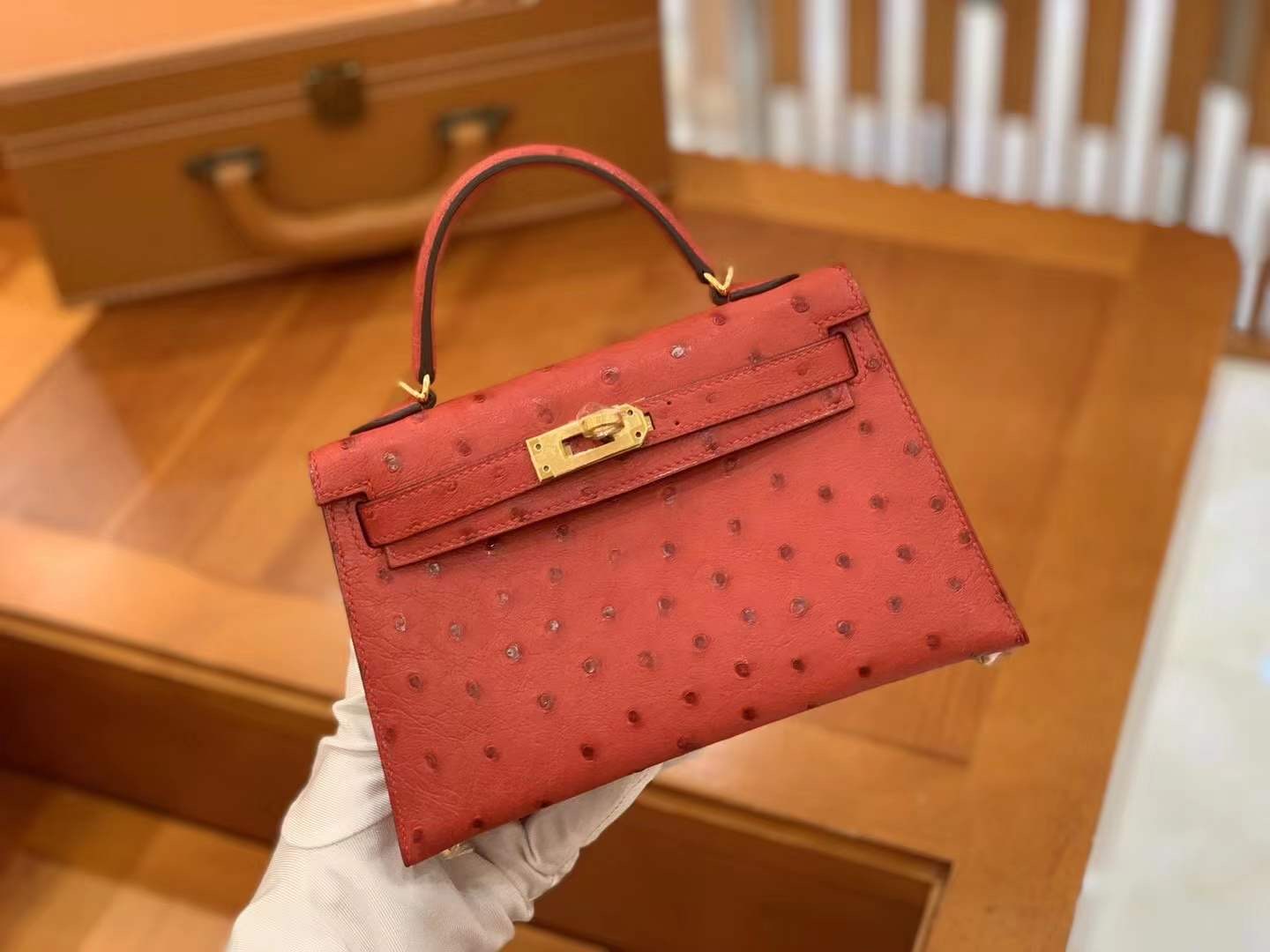 fb638e_63c3bcde71e24ba9a53e1dea4da9aa6amv2.jpg Mini Kelly Ostrich Garnet Red - Image 1