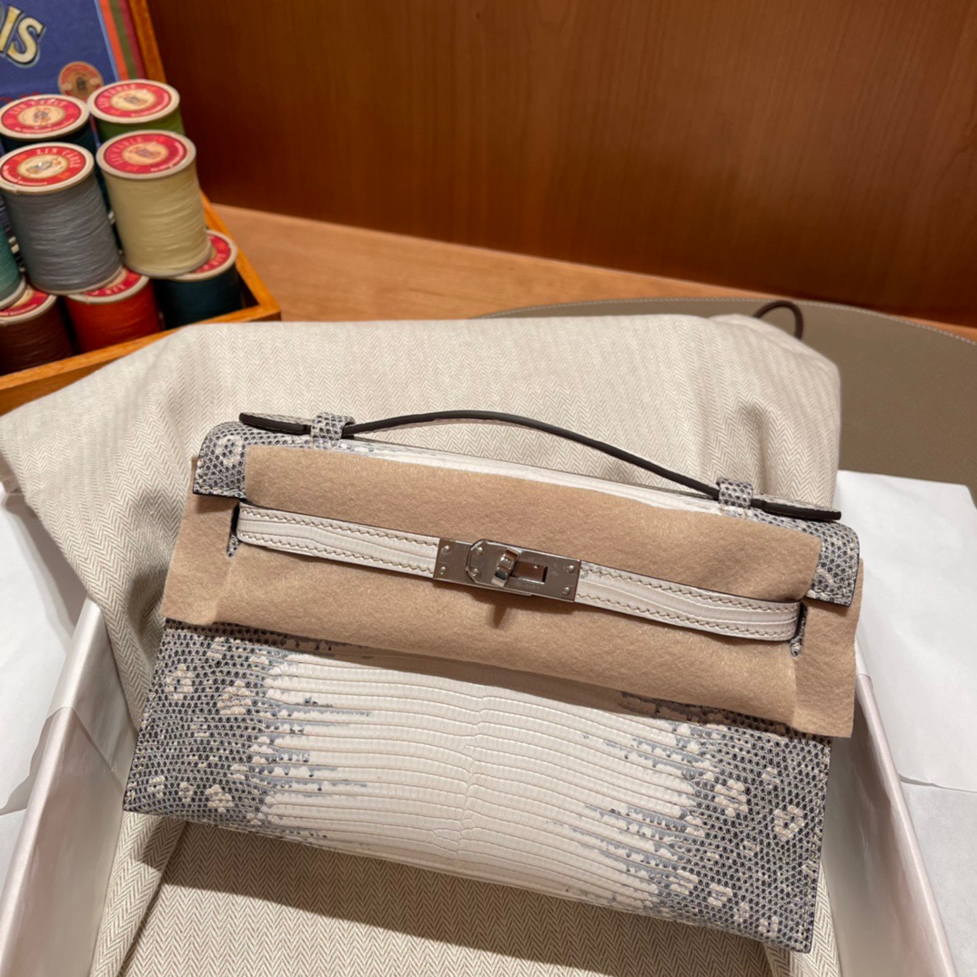 fb638e_80b2a7d06f274c879e5818401eda6485mv2.jpg Kelly Pochette Lizard Ombre - Image 1