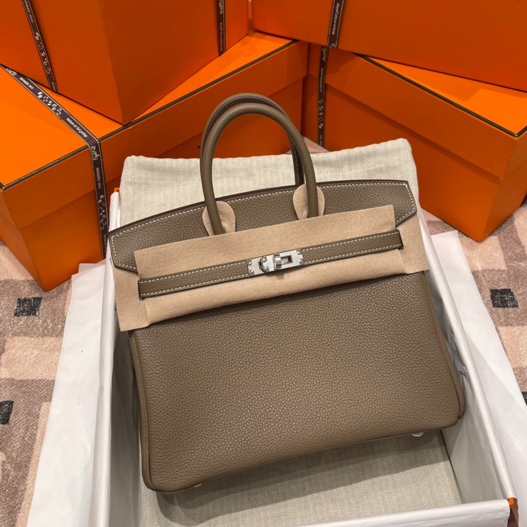 fb638e_82b1a52cc5a84e56906a27bcbbf1b750mv2.jpg Birkin 25 Togo Elephant Grey - Image 1