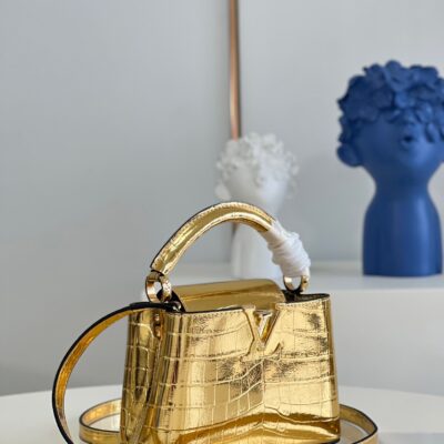 Louis Vuitton Capucines Mini Handbag in Bright Gold