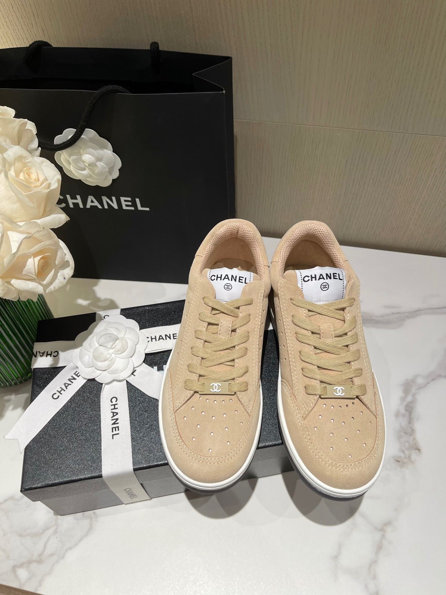 fb638e_89e4b0ffd61e4fcdba18ec1836de2b94mv2.jpg Chanel Sneakers - Image 1