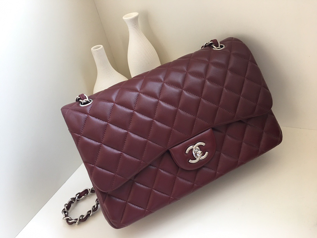 fb638e_8d1b9057bdb045b2aece6c8e7fc8372fmv2.jpg Chanel Classic Flap 30 Jumbo Maroon - Image 1