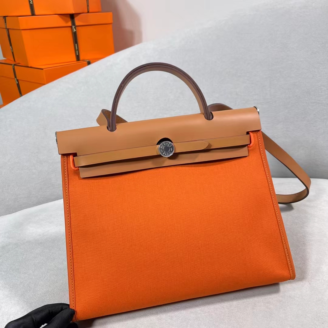 fb638e_8d38cc7dc115474583447746aeae3fd2mv2.jpg Herbag Hunter&Canvas Orange - Image 1