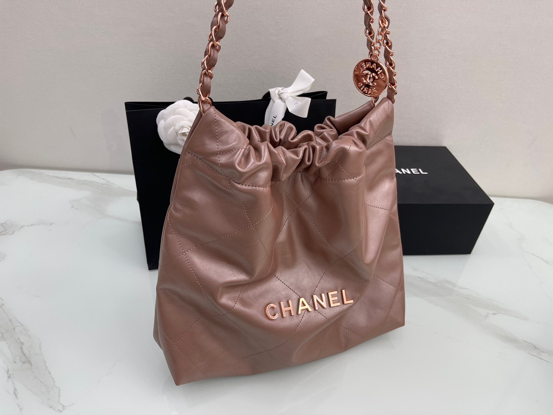fb638e_9b13502bbe614ae59835e21e0bd9b603mv2.jpg Chanel 22B Bag in Brown - Image 1