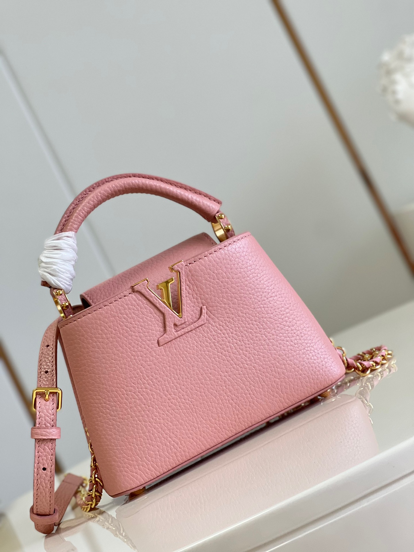Louis Vuitton Capucines Mini Handbag in Metal Pink