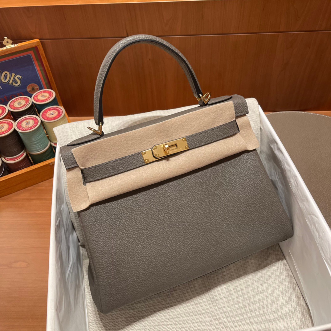 fb638e_a3c24bfbf1794fe1b010bf515b7bf9e1mv2.jpg Kelly 32 Togo Pewter Grey - Image 1