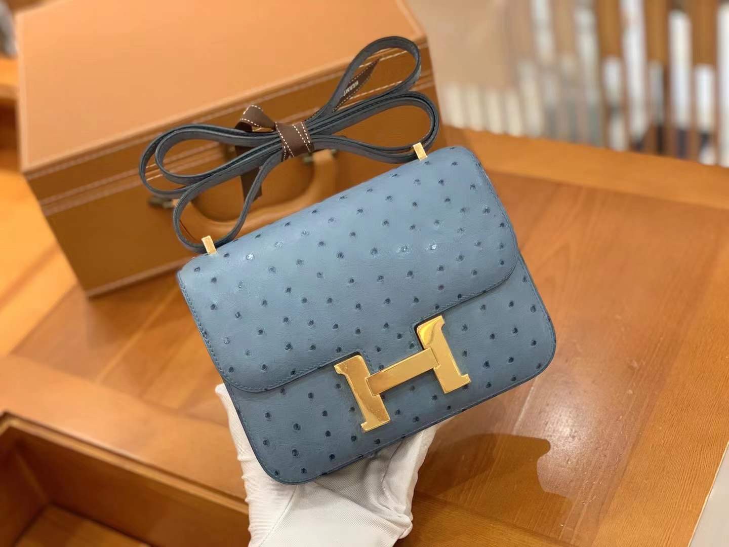 fb638e_a794fd2ed0ac4fb3adb8dec3f95881bdmv2.jpg Constance 18 Ostrich Denim Blue - Image 1