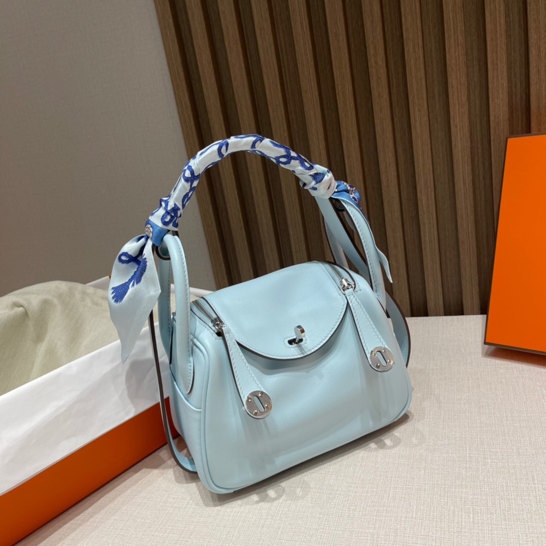 fb638e_a8ceef78363141fab63bad5236d3336cmv2.jpg Mini Lindy Swift Blue Brume - Image 1