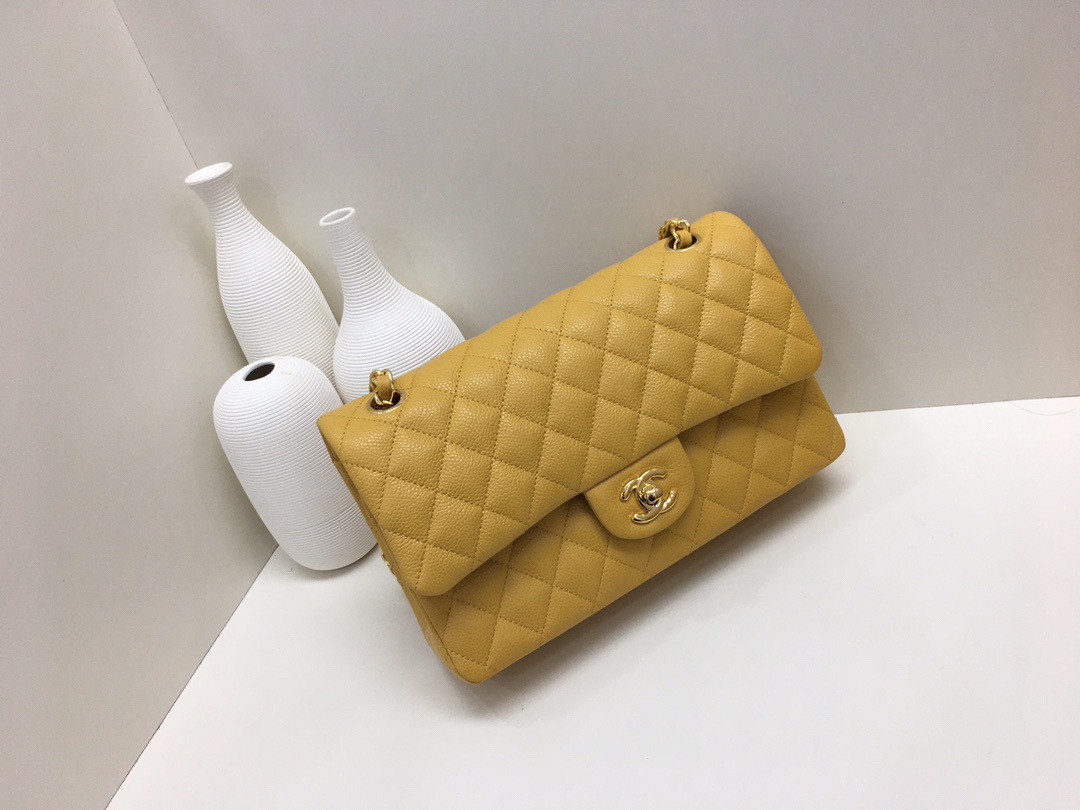 fb638e_ad1aa19f4f224f84829d0454bef546cbmv2.jpg Chanel Classic Flap 25 Mango Yellow - Image 1