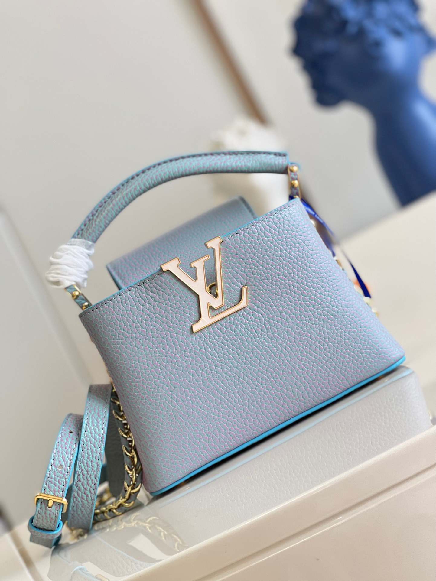 fb638e_b1126df8a6c544bc995ea2909b3499bamv2.jpg Louis Vuitton Capucines Mini Handbag in Stardust Pearl Blue - Image 1