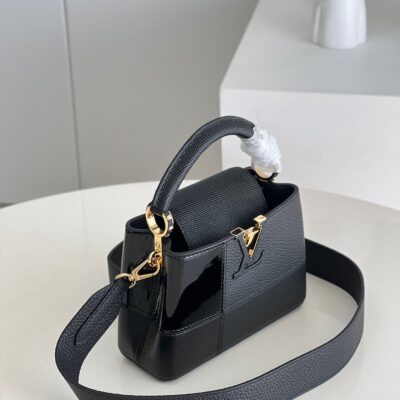 Louis Vuitton Capucines Mini Handbag in Black Puzzle