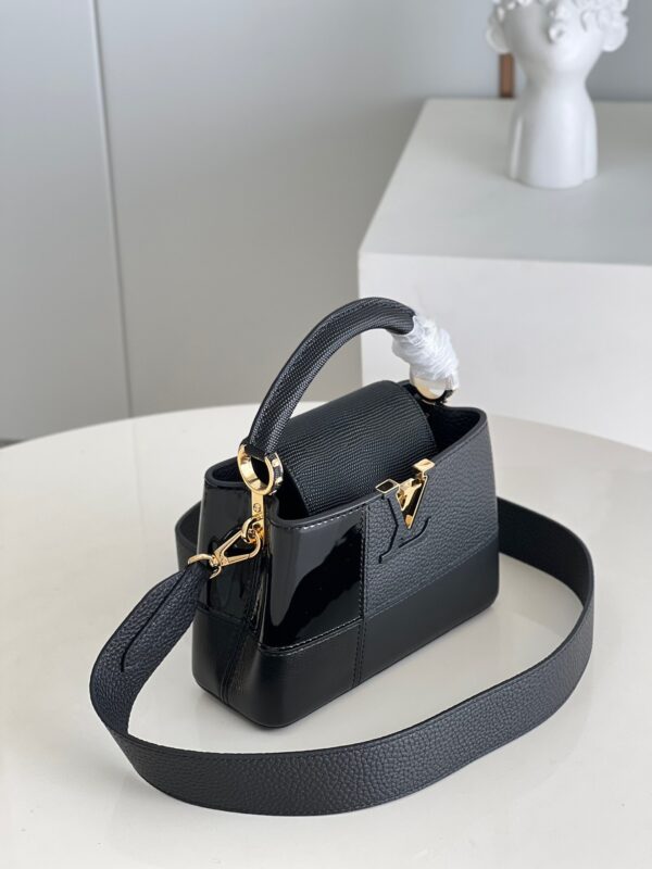 Louis Vuitton Capucines Mini Handbag in Black Puzzle