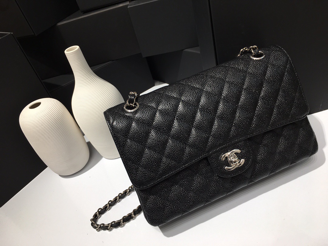 fb638e_bc1abb4fca074a1397bbbaac86953771mv2.jpg Chanel Classic Flap 25 Black - Image 1