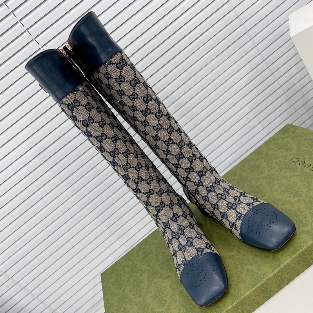 fb638e_c59c672b28e548a7a57d2b3a135fbf32mv2.jpg Gucci Knee-High Boots - Image 1