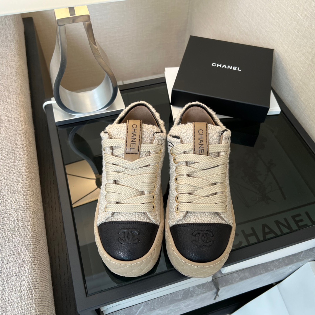 fb638e_cb35e52791e34c76991819f1792524c8mv2.jpg Chanel Sneakers - Image 1
