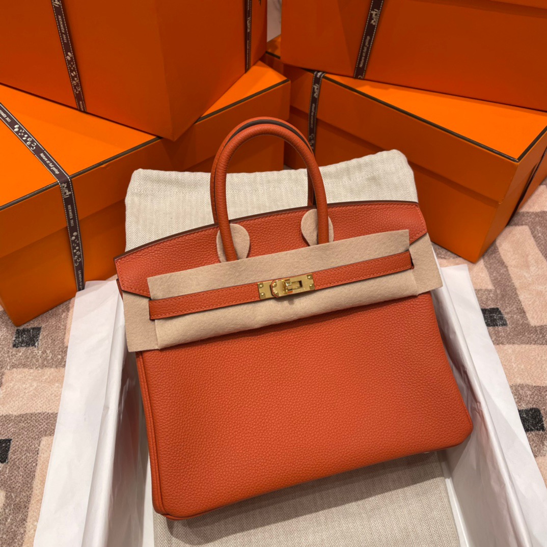 fb638e_cbb1450923154ef586fbc1894d6451b4mv2.jpg Birkin 25 Togo Orange - Image 1