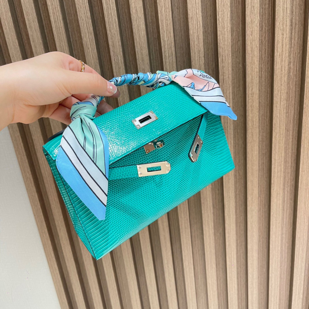 fb638e_d102dcd4d3524394b96a4f4ccc43cc84mv2.jpg Kelly Pochette Lizard Menthe - Image 1