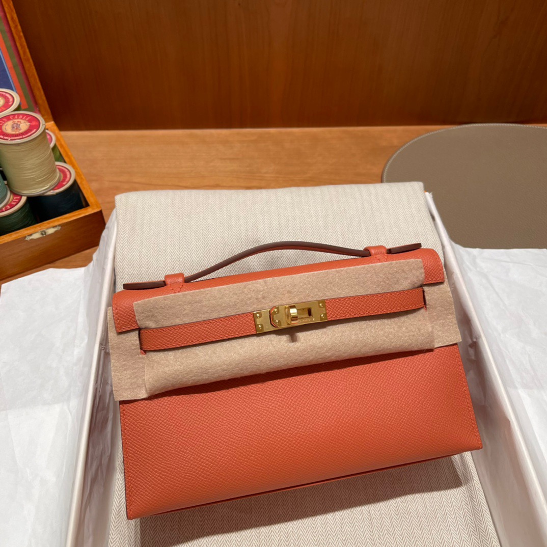 fb638e_d392846391ca450584172e184a336a32mv2.jpg Kelly Pochette Epsom Rose Tea Pink - Image 1