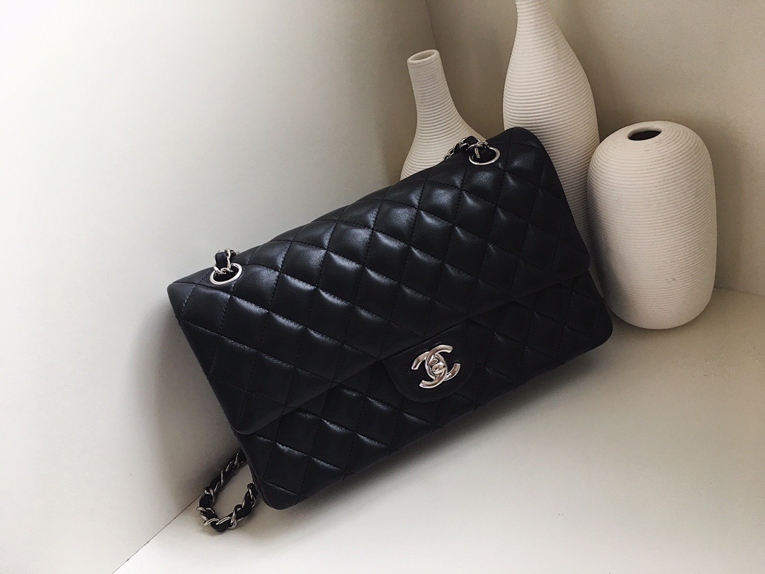 fb638e_d9c2266476dd44019790956077d0c451mv2.jpg Chanel Classic Flap 25 Jumbo Black - Image 1