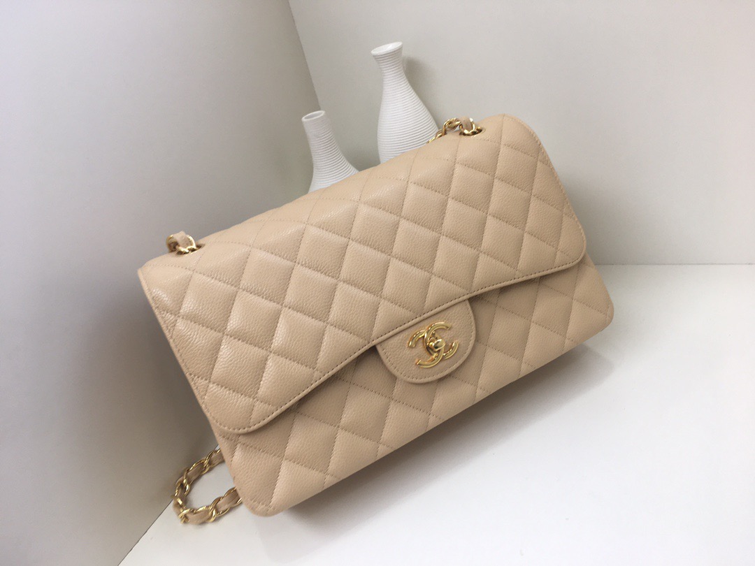 fb638e_dc40505ab0a1458b930d6bebb2fc3552mv2.jpg Chanel Classic Flap 30 Apricot - Image 1