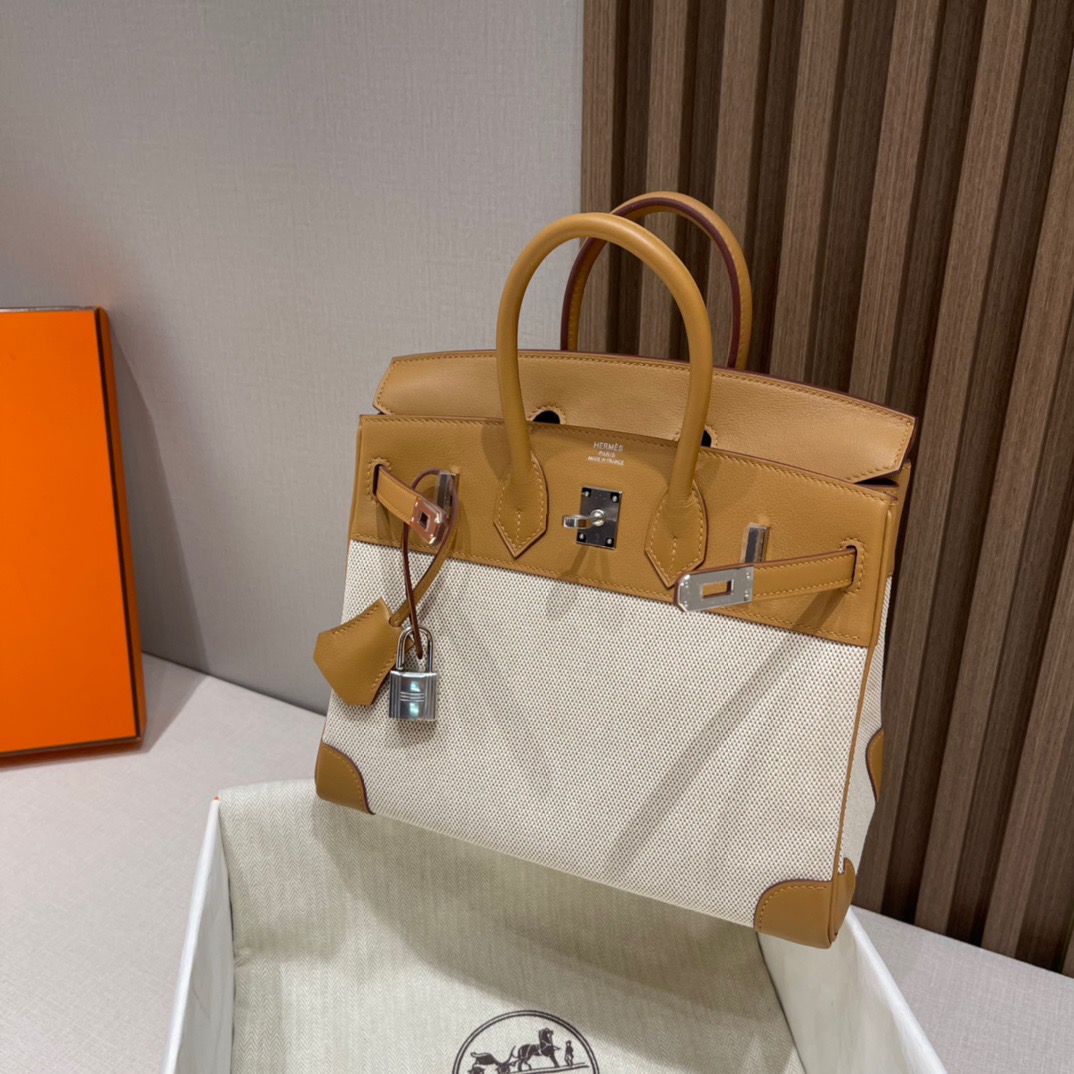 fb638e_dd6cacfd629c49a59b1d62b1111bb6admv2.jpg Birkin HAC Canvas&Swift Biscuit - Image 1