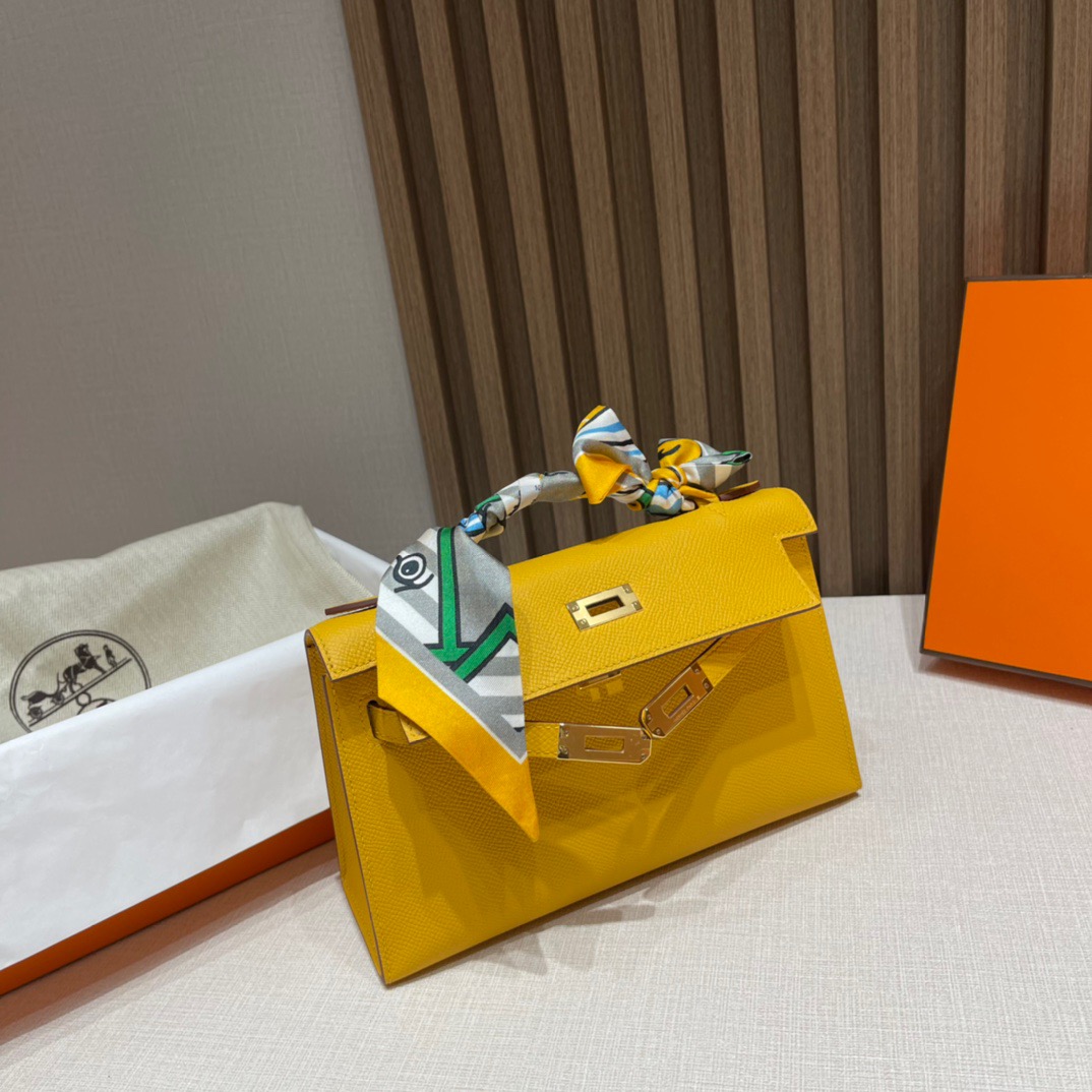 fb638e_dd8a489a2fbe4a5a824d64d3943b5ed8mv2.jpg Kelly Pochette Epsom Jaune Ambre - Image 1