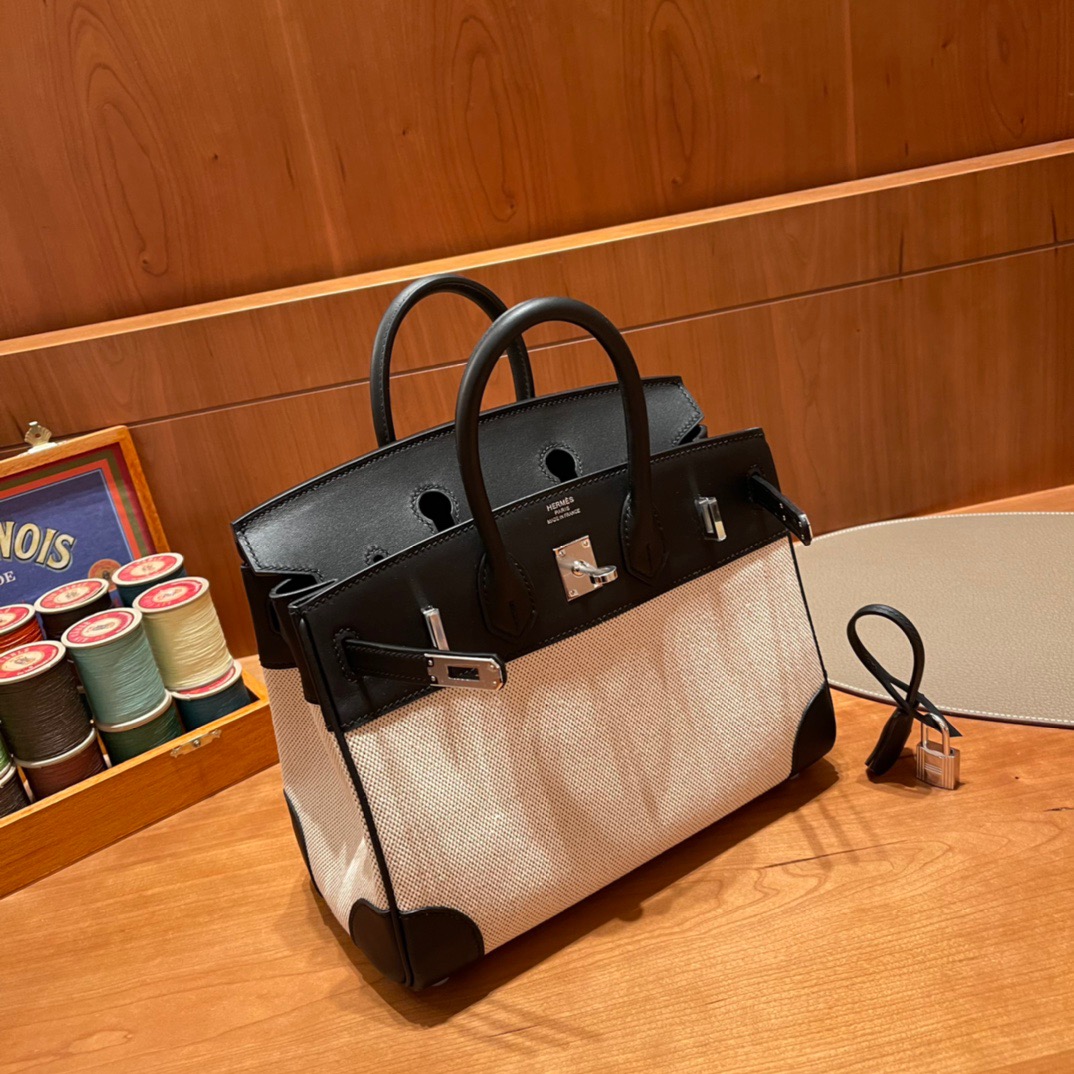 fb638e_ea11cb2d8f664e419650a9781d5ec49amv2.jpg Birkin HAC Canvas&Swift Black - Image 1