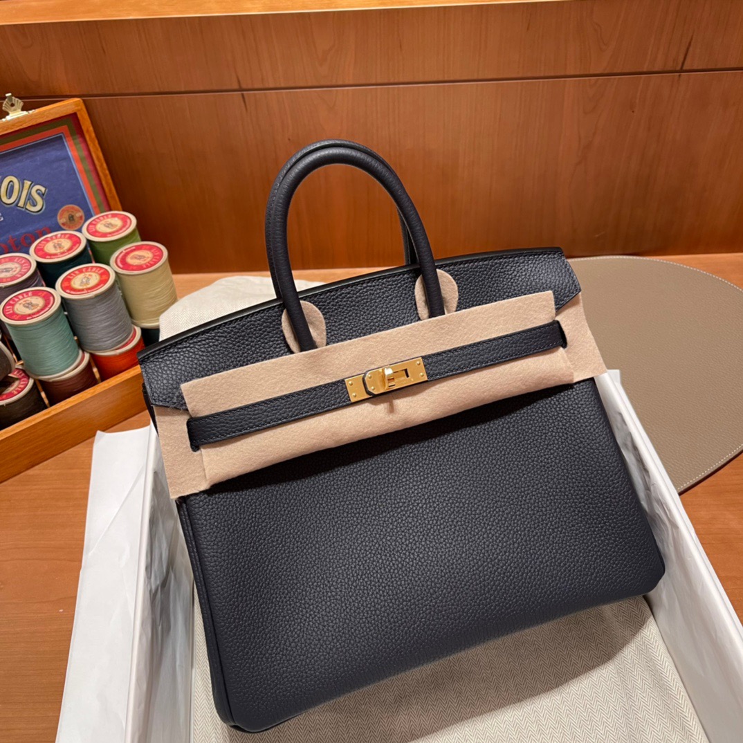 fb638e_eec0c7dee82346bfbad90c25b85c5f62mv2.jpg Birkin 25 Togo Midnight Blue - Image 1