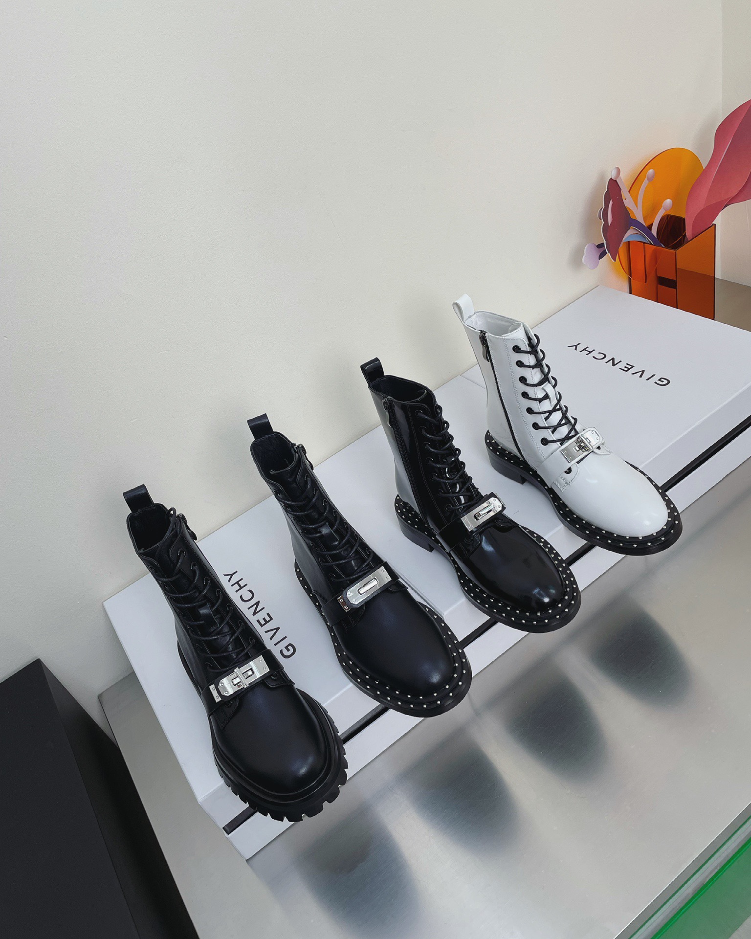 fb638e_f3b38c9fd5e24726a1c1b637724007d0mv2.jpg Givenchy Beaded Leather Ankle Boots - Image 1