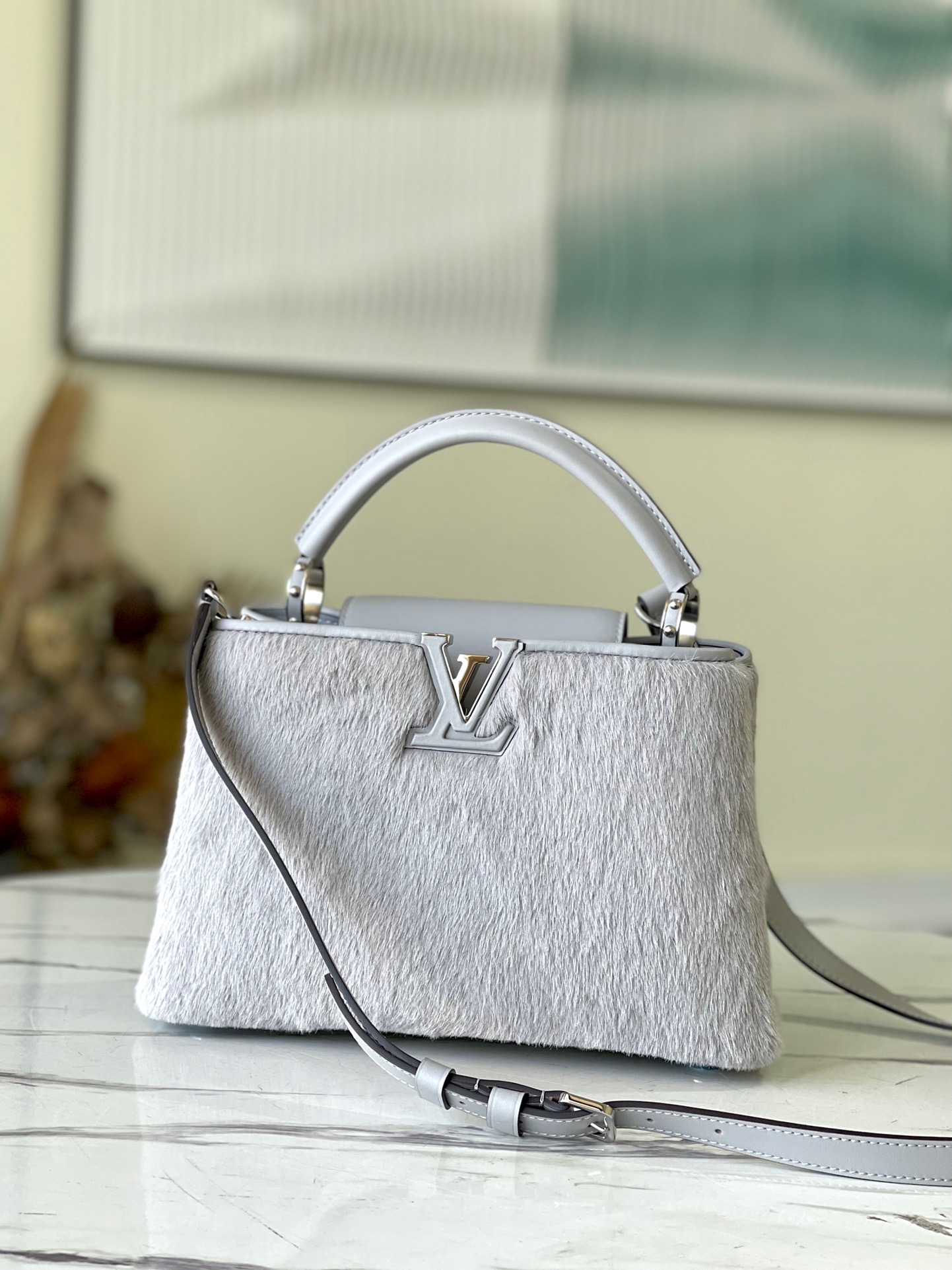 fb638e_f79bcc1570f448d382727eb9f49b1445mv2.jpg Louis Vuitton Capucines BB Small Handbag in Gray Mink - Image 1