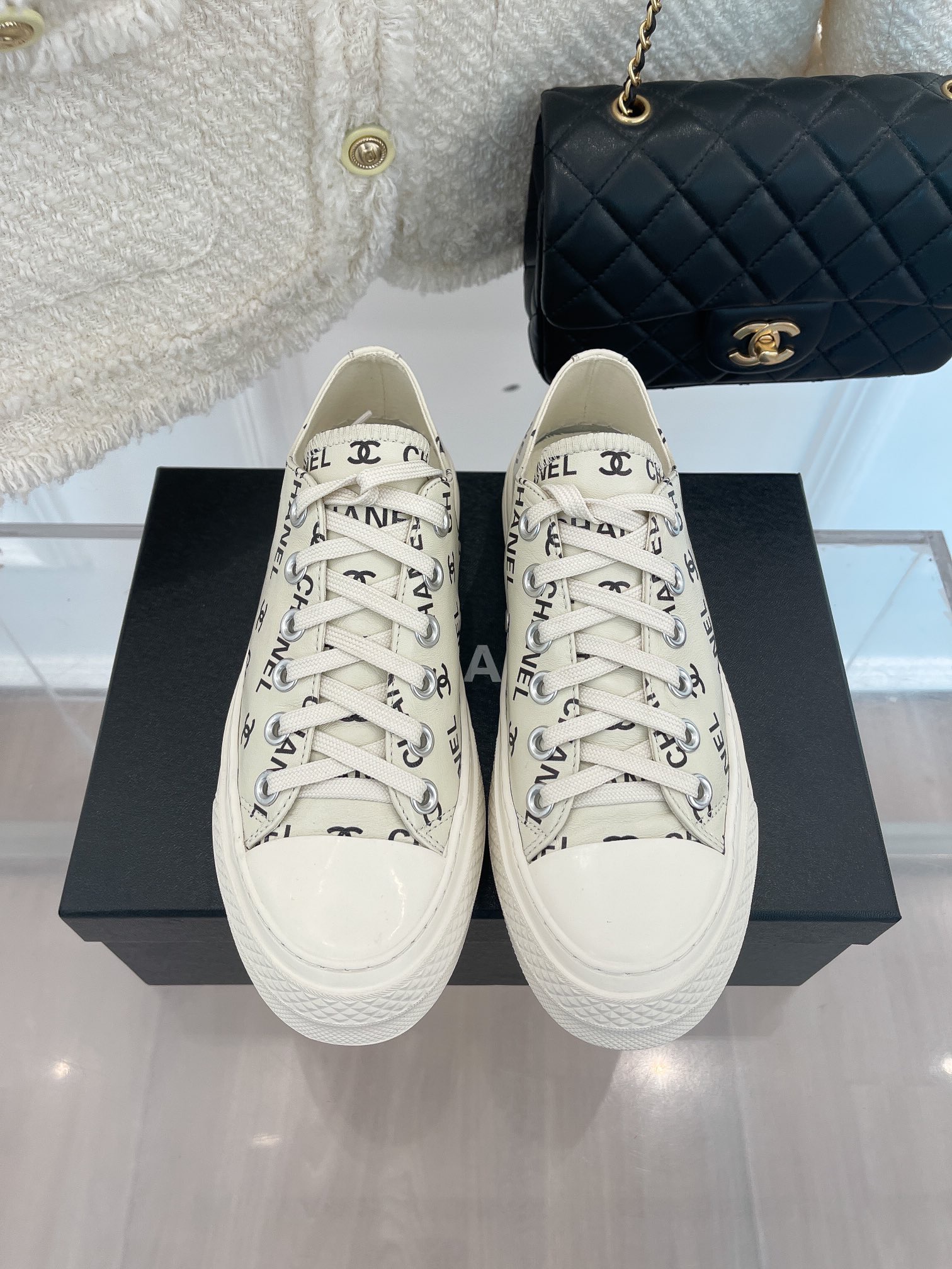 fb638e_f898dea80f0f4f29a36aaff58baf77b0mv2.jpg Chanel Sneakers - Image 1