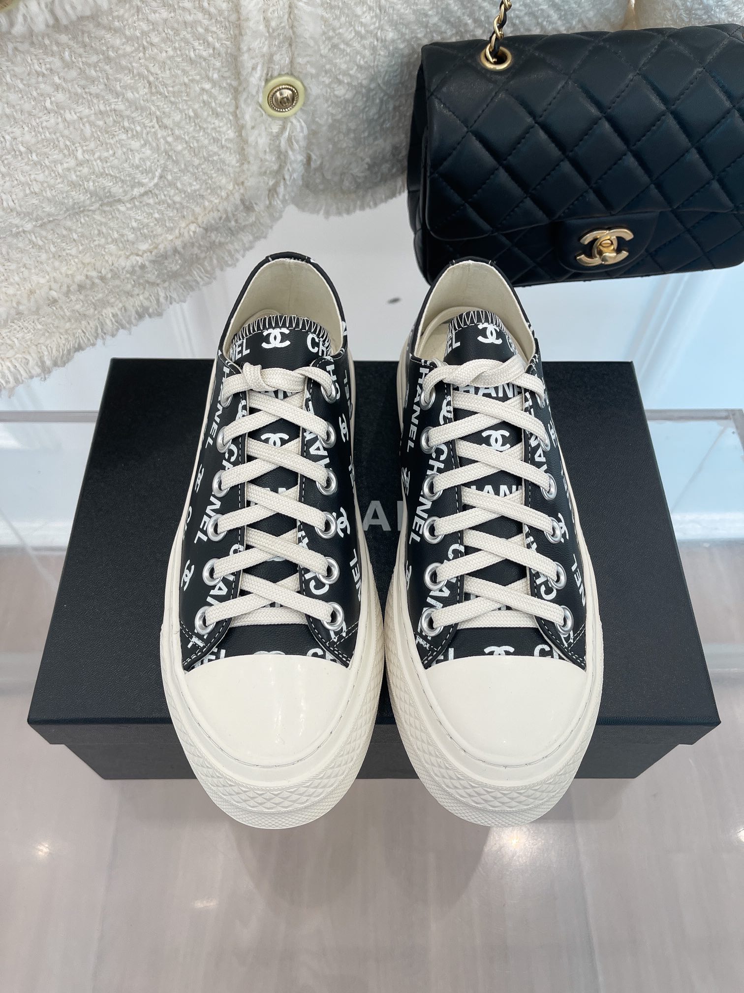 fb638e_fbc00e0bbdf24ceebb61d63c0d78d3eemv2.jpg Chanel Sneakers - Image 1
