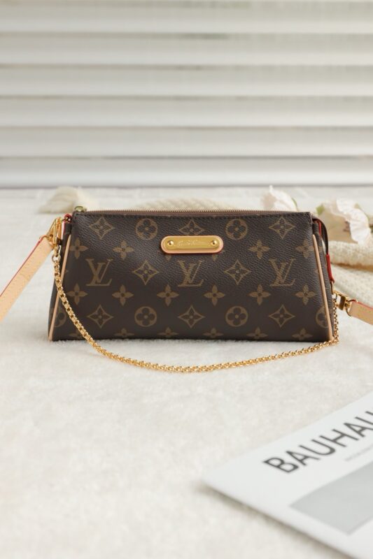 LV Monogram Eva Clutch